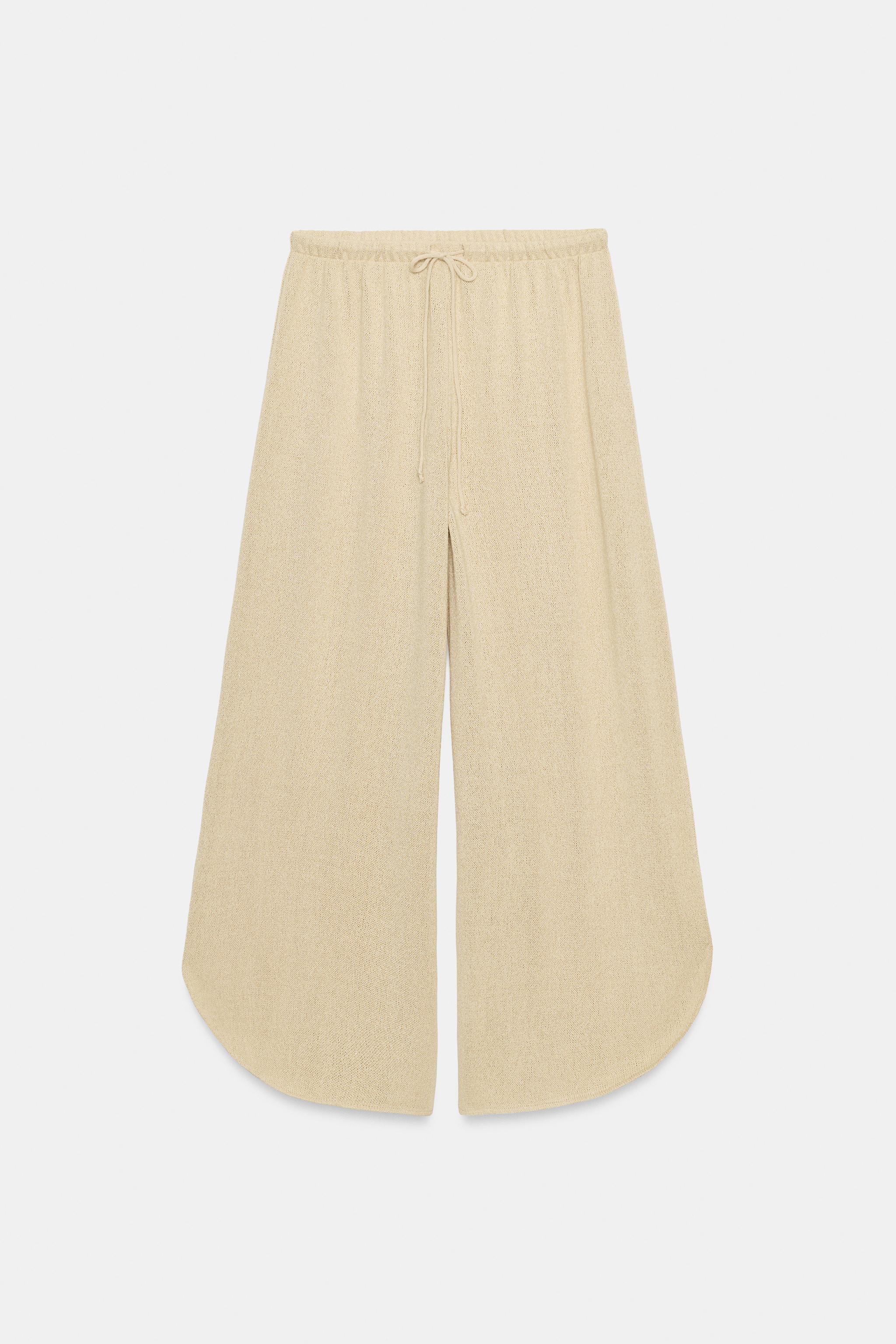 PANTALON RUSTIQUE À FENTES